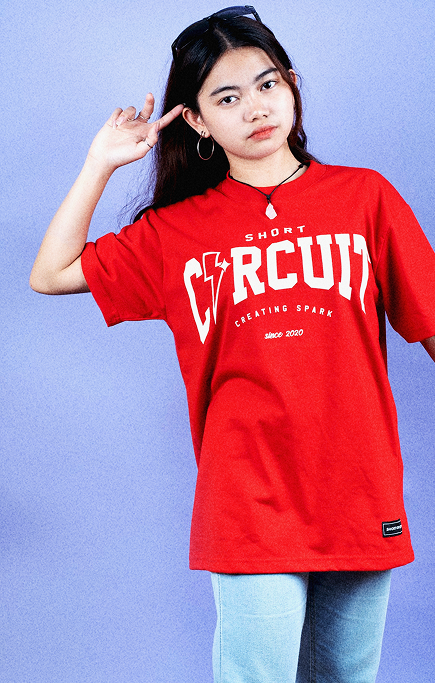 Model wearing red Arc Logo t-shirt